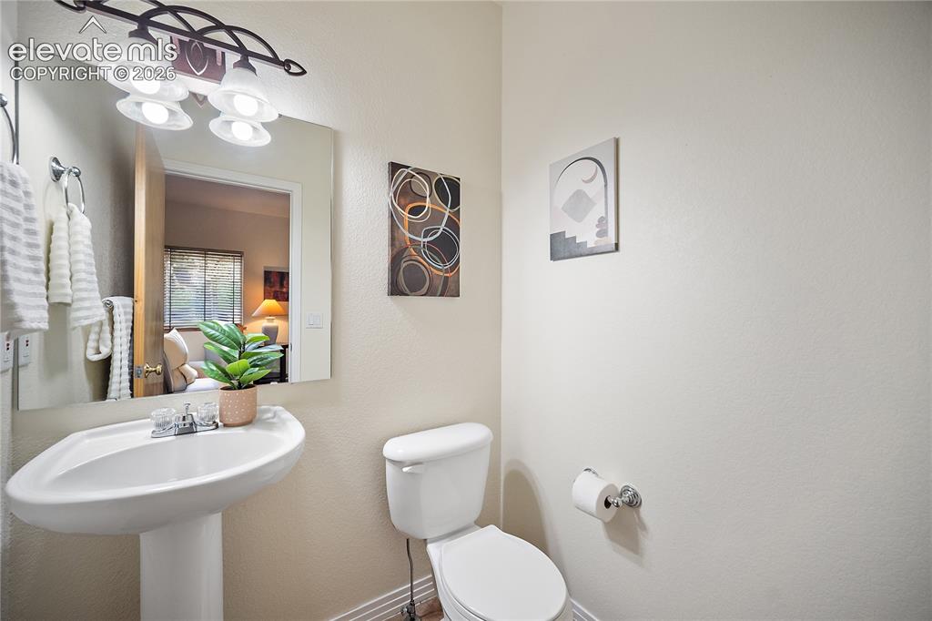 Image 7 of 40: Main level 1/2 bath