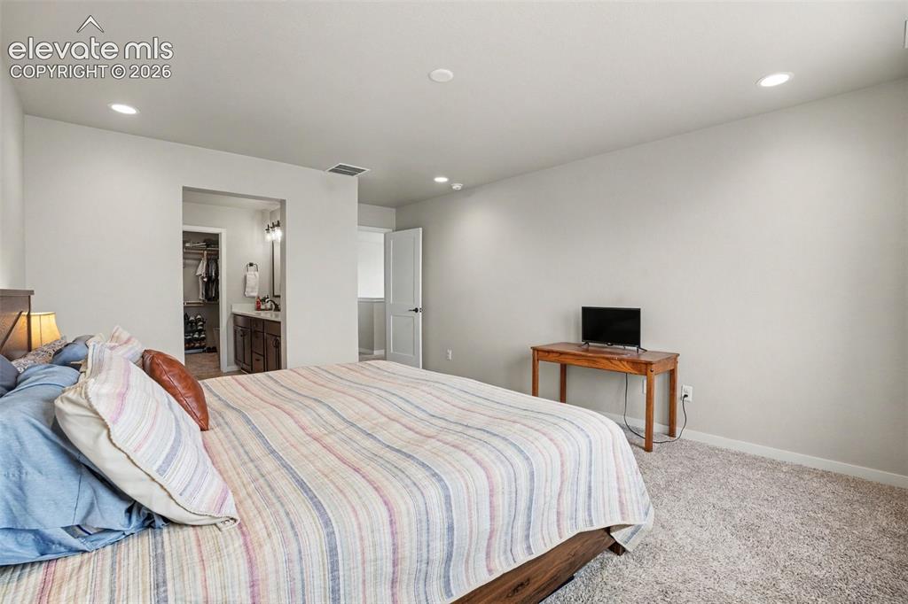 Image 18 of 34: Master Bedroom