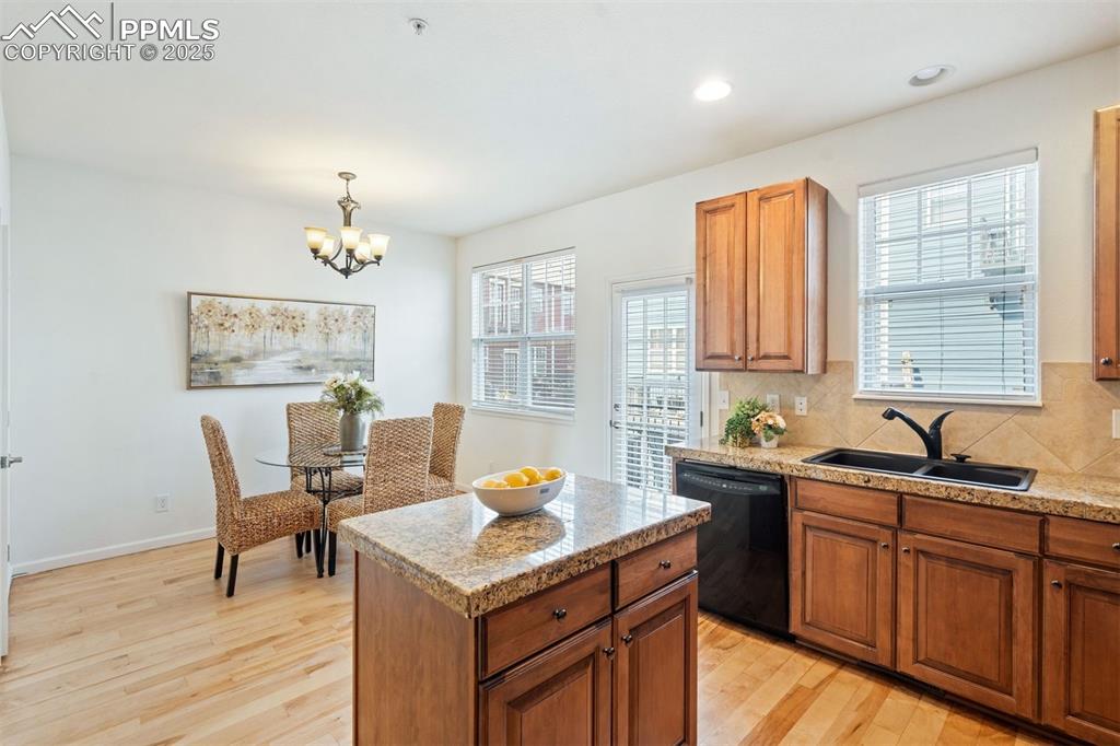 Image 18 of 43: The kitchen has a wonderful eat-in nook space that connects effortless cook