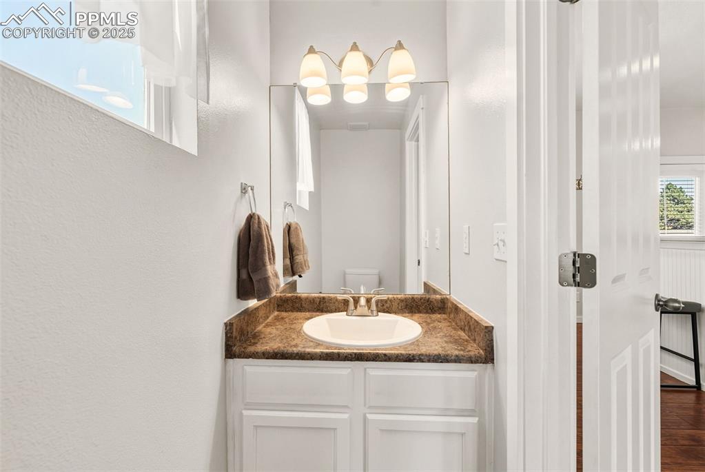 Image 10 of 33: Powder room on the main level