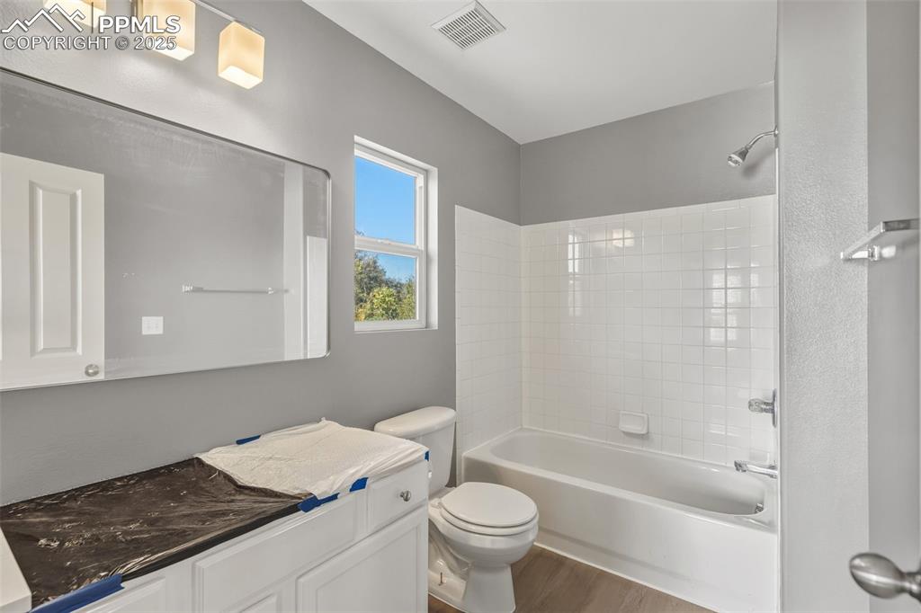 Image 17 of 33: Upstairs bedroom 2 attached bathroom