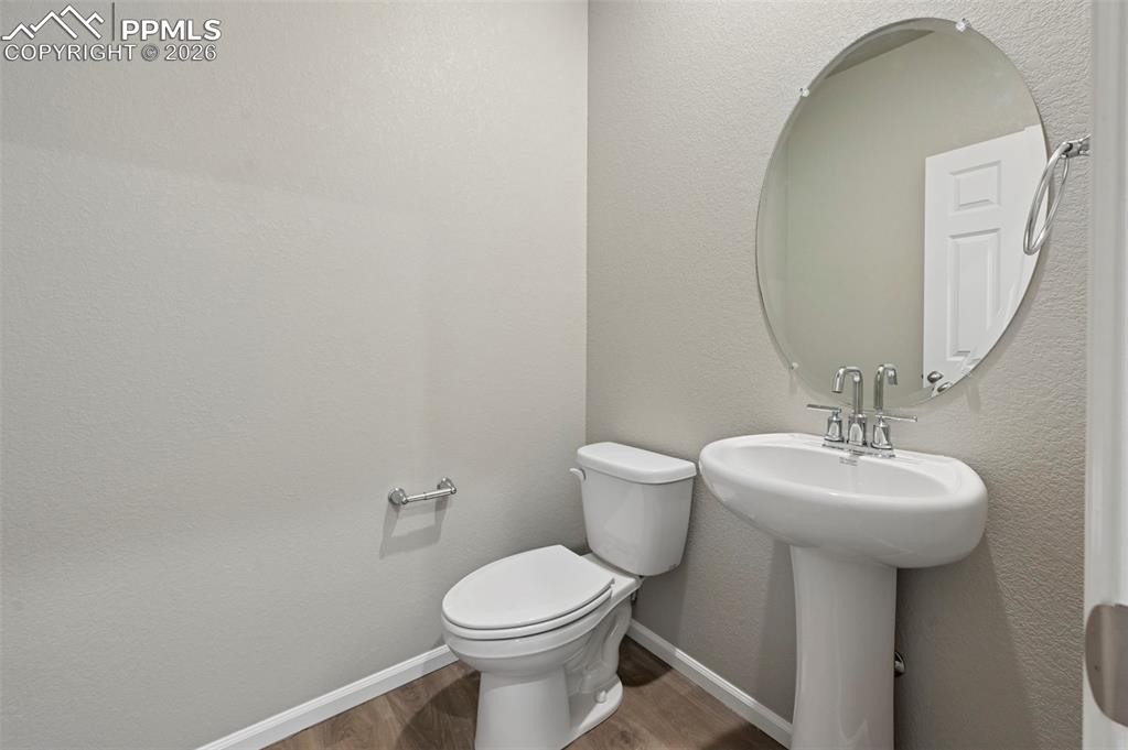 Image 12 of 39: Main floor 1/2 bathroom