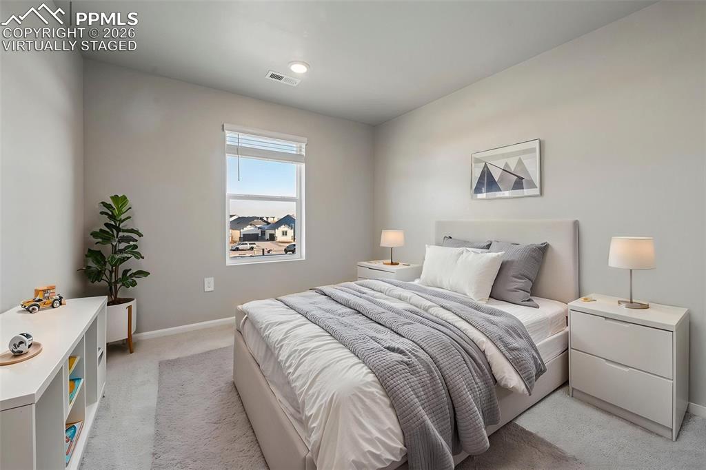 Image 27 of 39: Virtually staged bedroom