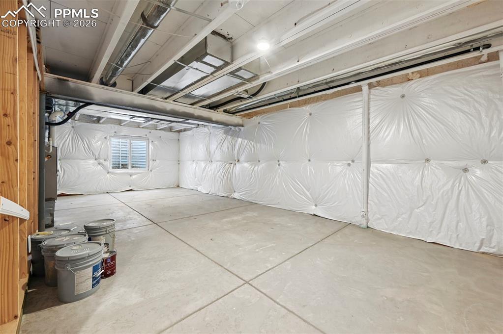 Image 31 of 39: Unfinished basement awaits your creative finishes!  