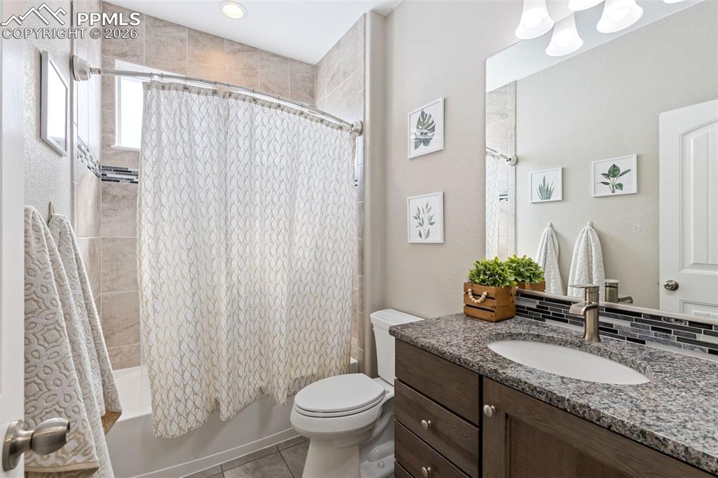 Image 21 of 46: Full bath just a step from bdrm 2