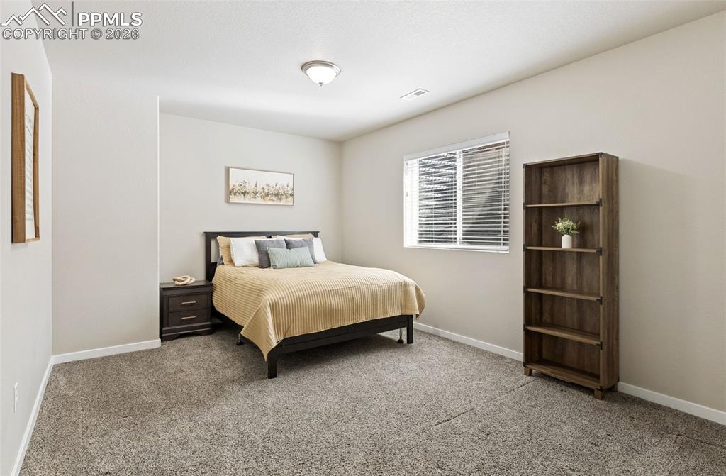 Image 27 of 46: Bedroom 3 in basement