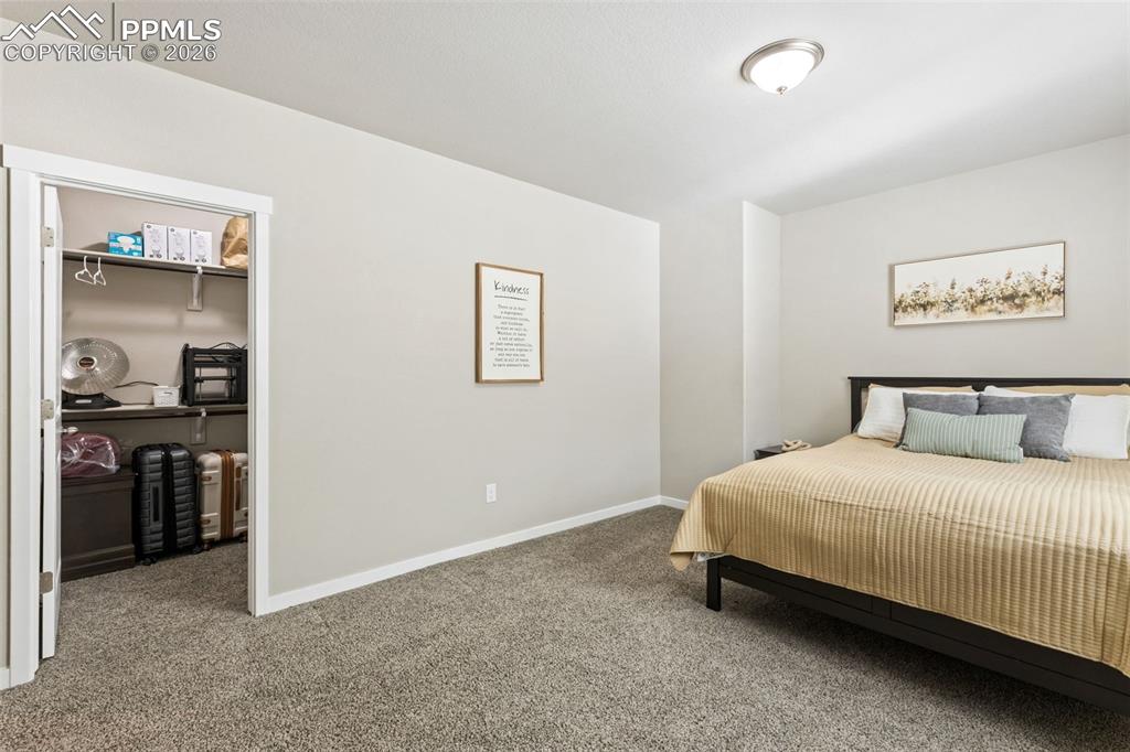 Image 28 of 46: Bedroom 3 with walk-in closet