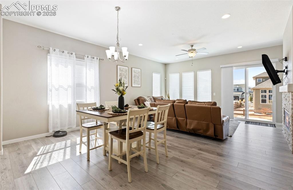 Image 9 of 46: Open flow, dining & living w/ backyard access on the right