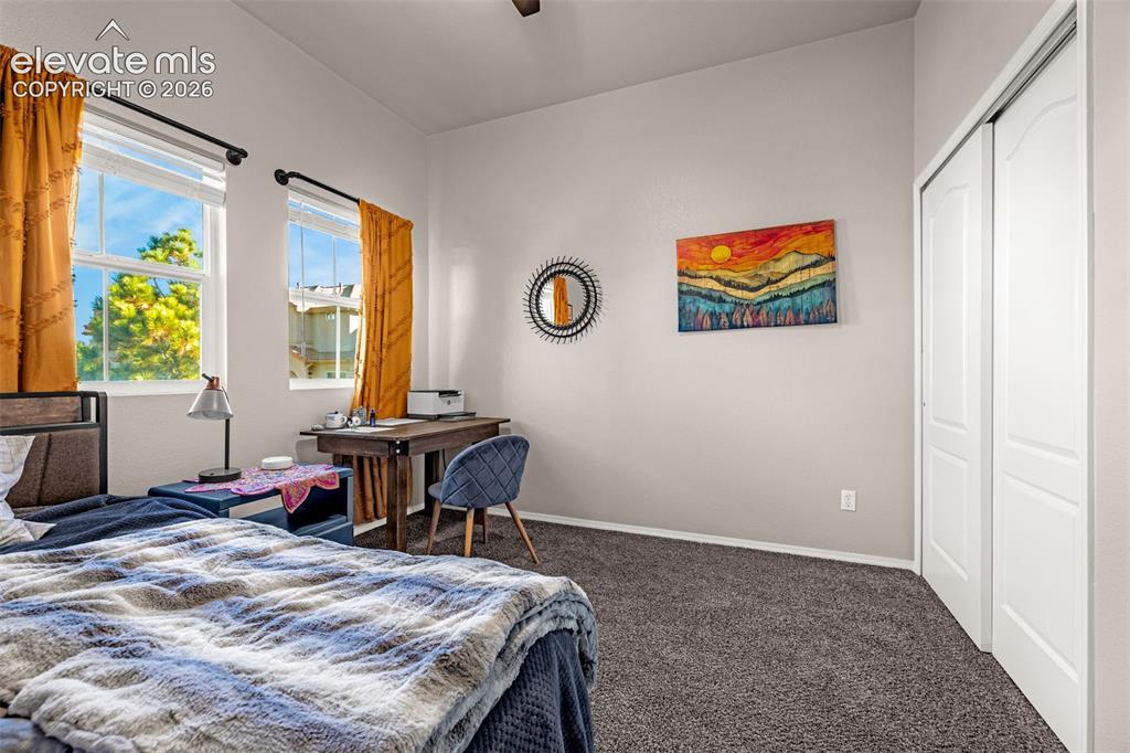Image 15 of 27: Dual windows with natural light, high ceilings, neutral wall tones, wall-to