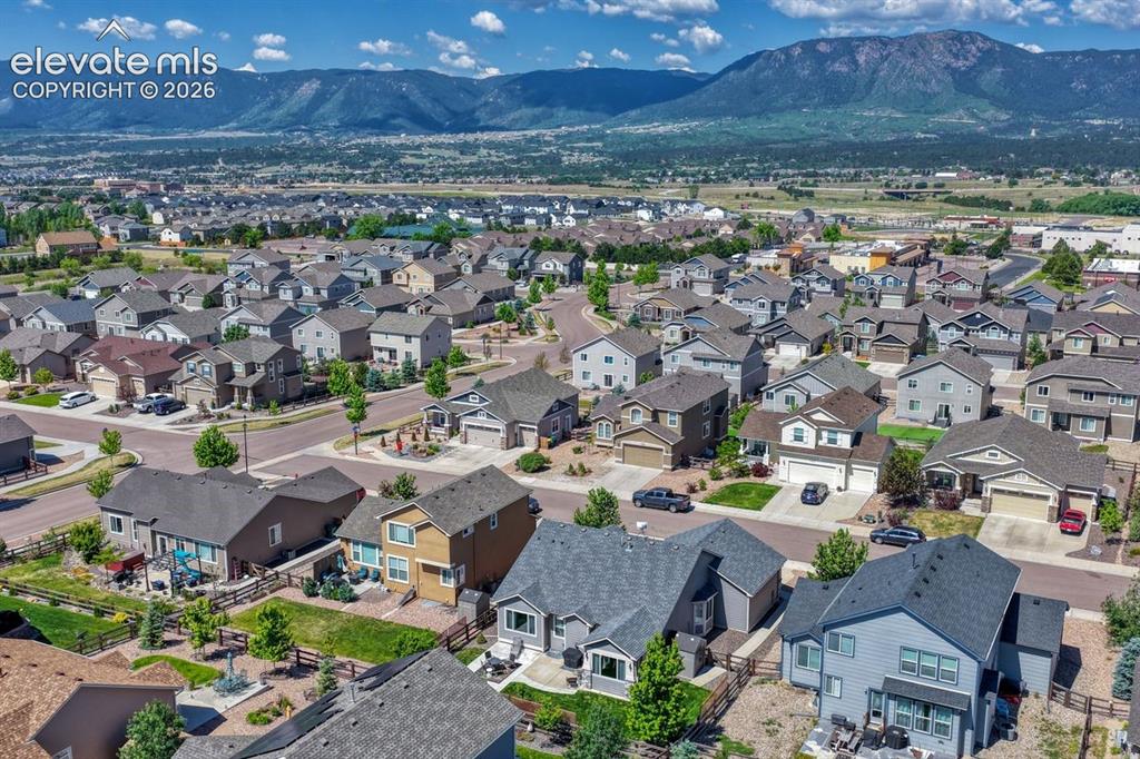 Image 45 of 50: Expansive residential neighborhood featuring a variety of home styles with