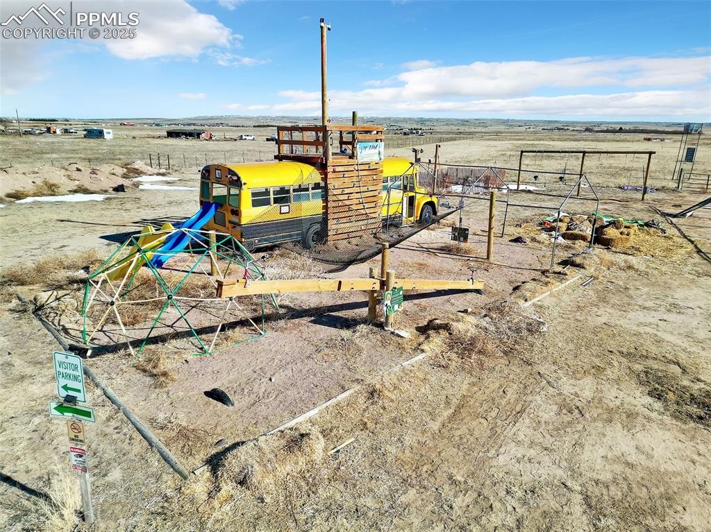 Image 12 of 44: View of playground featuring a rural view