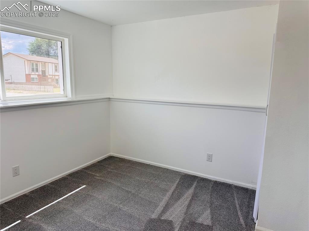Image 9 of 11: Spare room with carpet