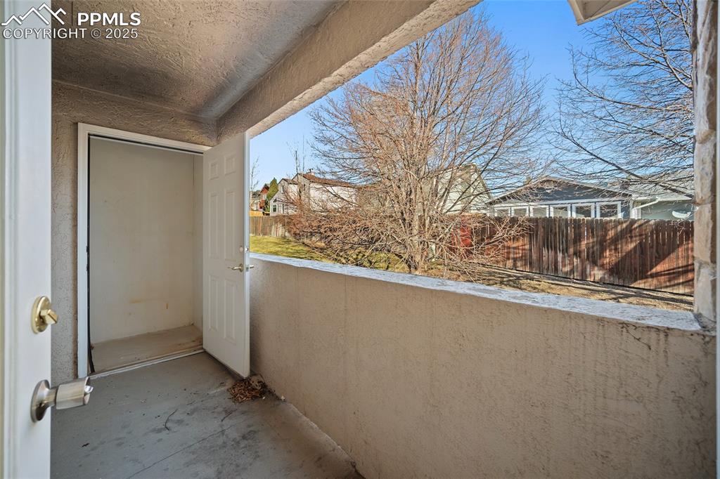 Image 9 of 31: balcony w/ storage