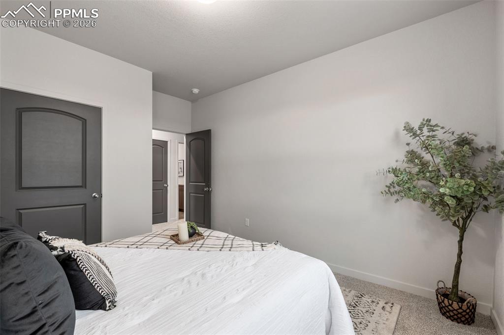 Image 27 of 38: Bedroom