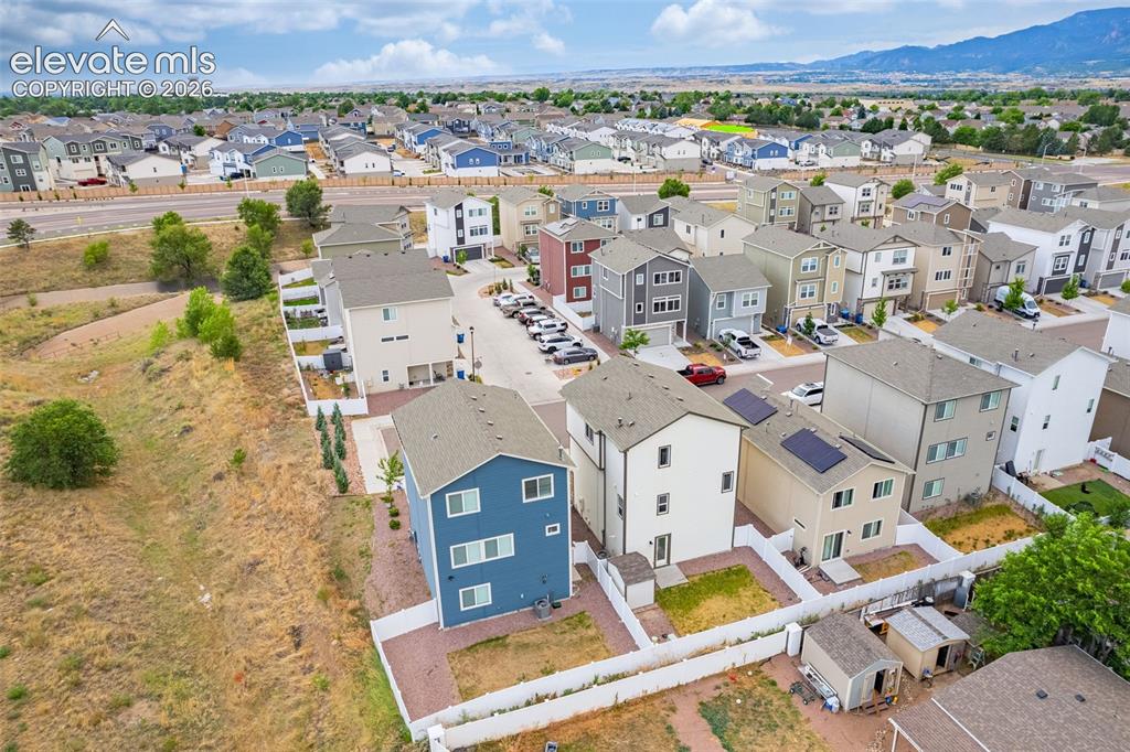 Image 11 of 46: Aerial perspective of a contemporary residential development featuring mult