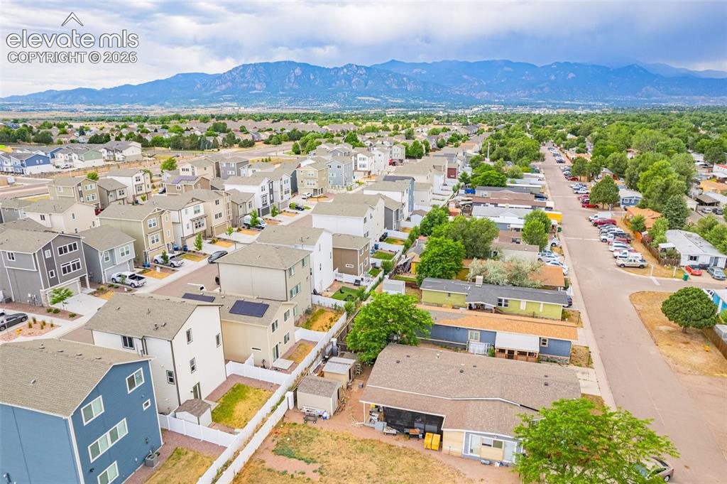 Image 12 of 46: Aerial perspective showcasing a residential neighborhood with varied housin
