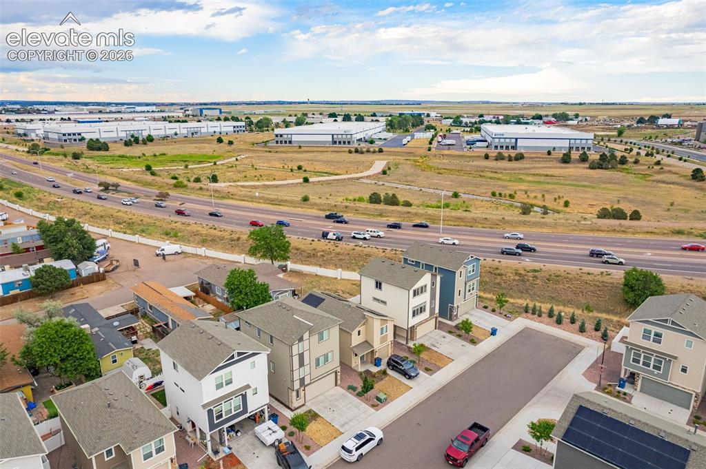 Image 14 of 46: Aerial perspective showcasing multiple contemporary residential properties 