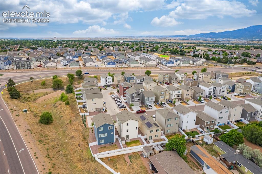 Image 16 of 46: Aerial perspective showcasing a residential development with multiple detac