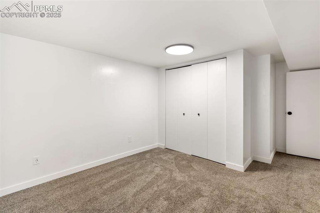 Image 30 of 38: Bedroom