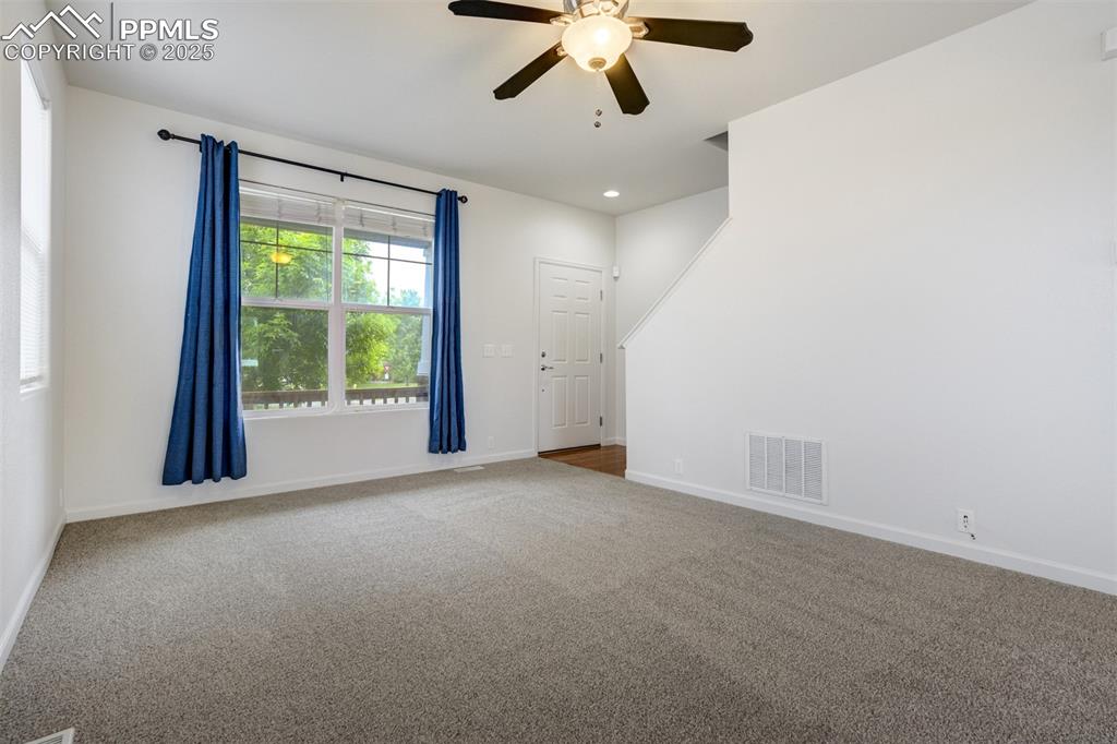 Image 18 of 50: Living room at front of house
