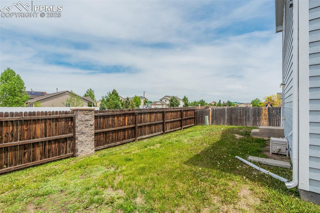 Image 48 of 50: View of fenced yard
