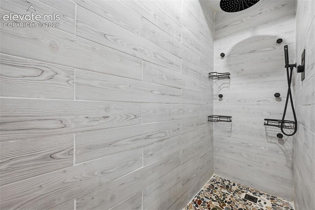 Image 17 of 33: primary walk in shower