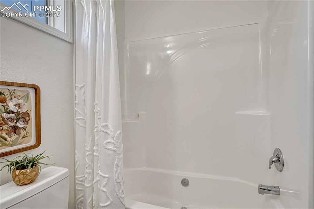 Image 20 of 48: One piece shower and tub combo with built-in soap/shampoo shelves
