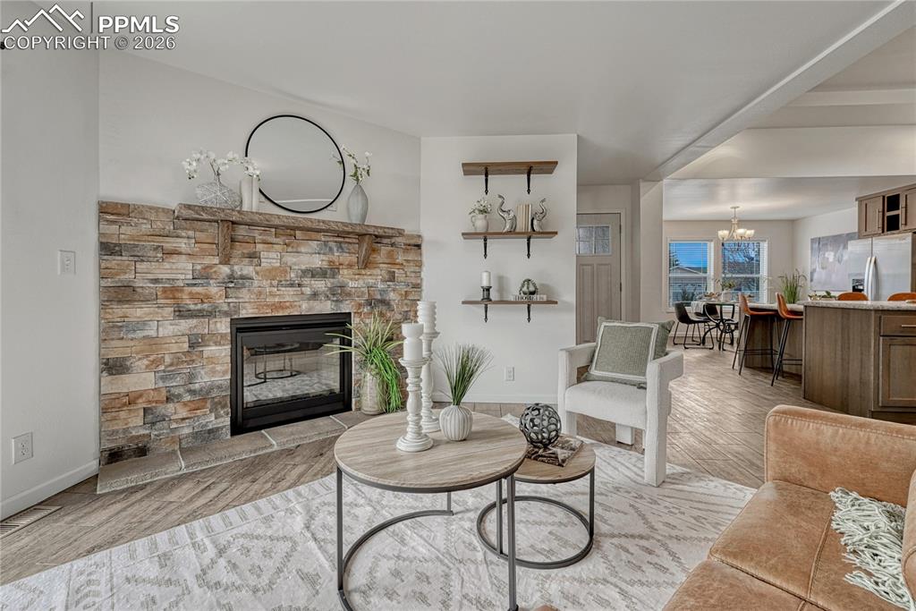 Image 3 of 48: Enter into the open layout home where you’ll find a large kitchen and livin