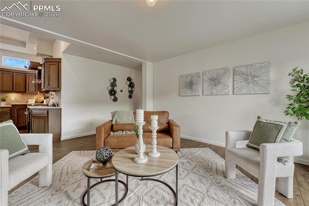 Image 4 of 48: Luxury vinyl plank flooring in the main living spaces and plenty of room fo