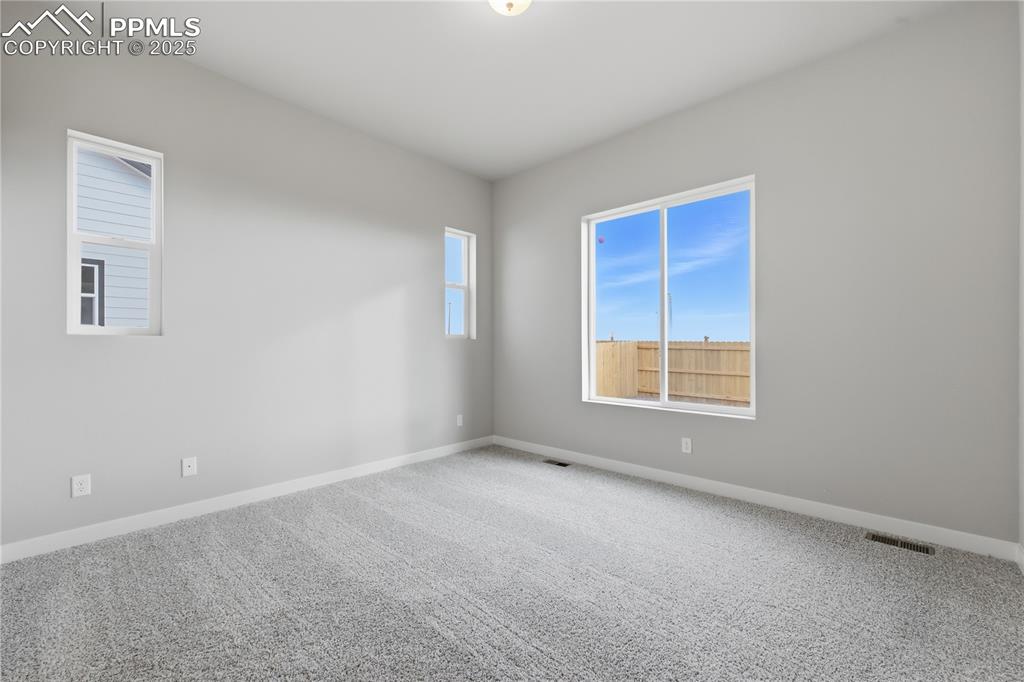 Image 16 of 29: Master Bedroom