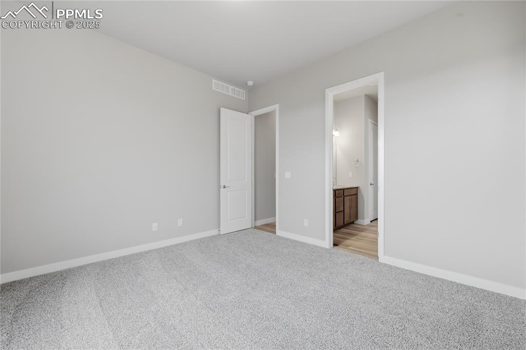 Image 18 of 29: Master Bedroom