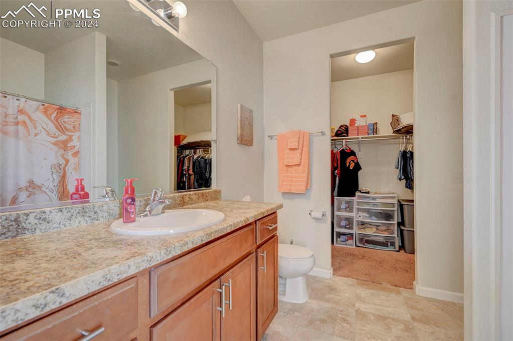 Image 15 of 45: Bathroom with vanity and toilet