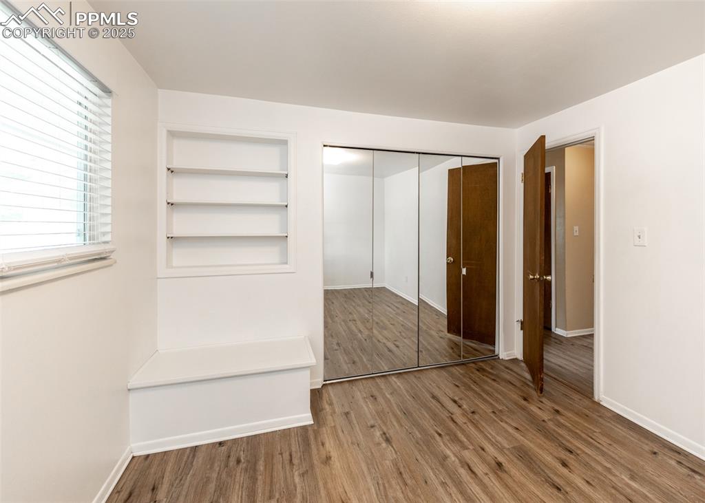 Image 11 of 22: Main level bedroom 1