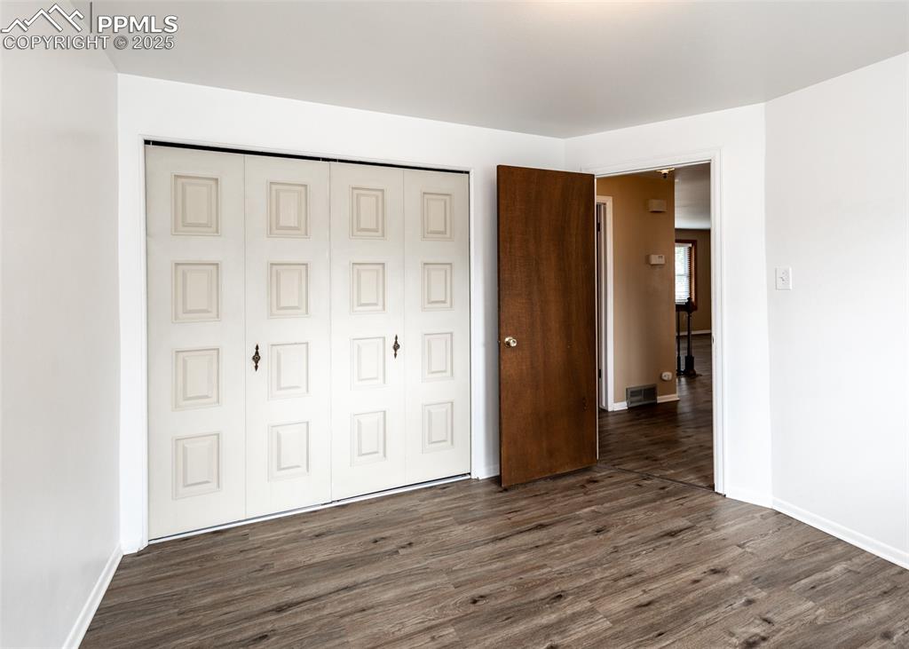 Image 12 of 22: Main level bedroom 2