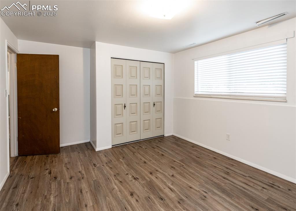 Image 17 of 22: Basement Bedroom 1
