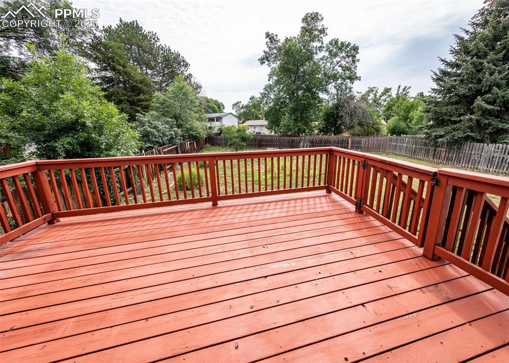 Image 20 of 22: View of backyard from deck