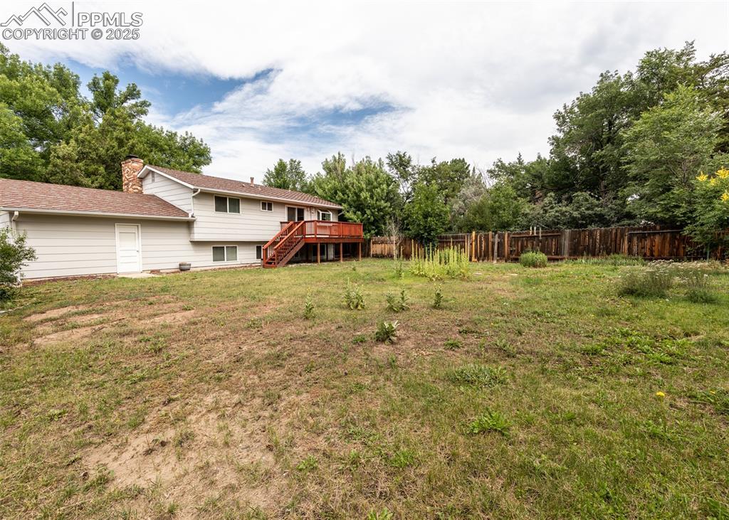 Image 21 of 22: View of backyard