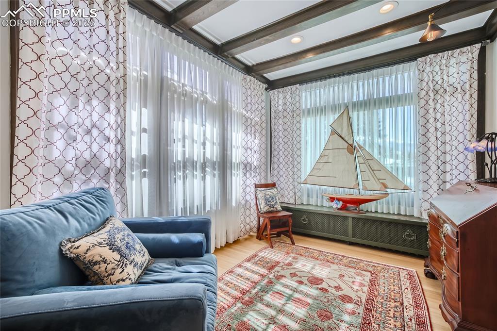 Image 20 of 49: Large picture window with views of Pikes Peak