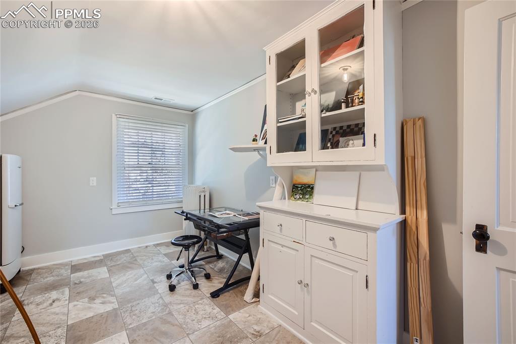 Image 47 of 49: Art Studio with ornamental molding