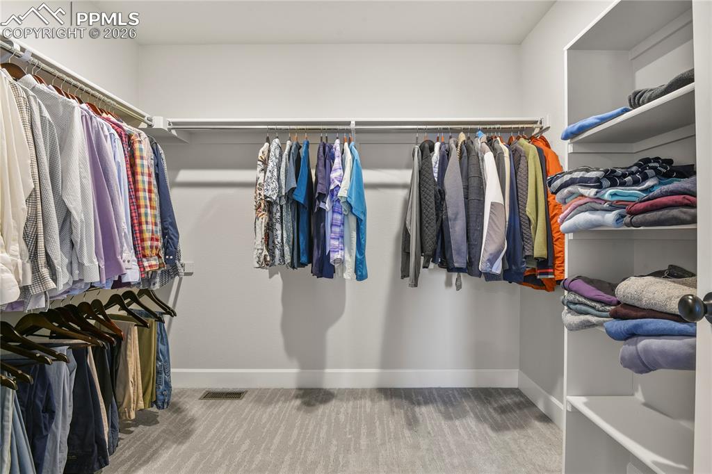 Image 19 of 27: Large walk-in closet