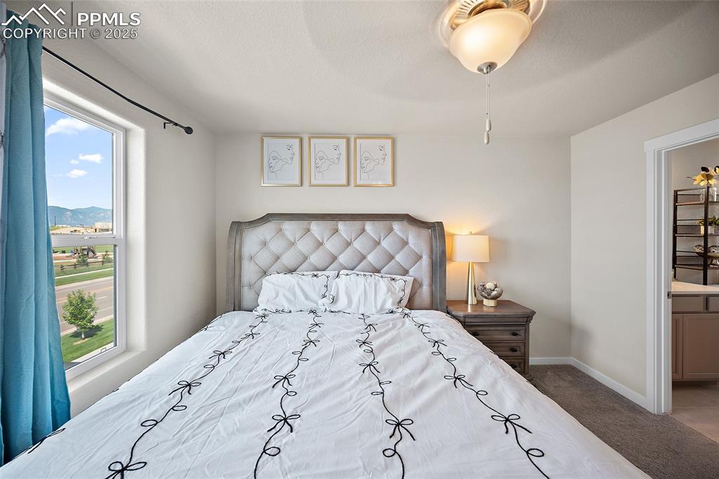 Image 8 of 41: Bedroom featuring carpet flooring and baseboards