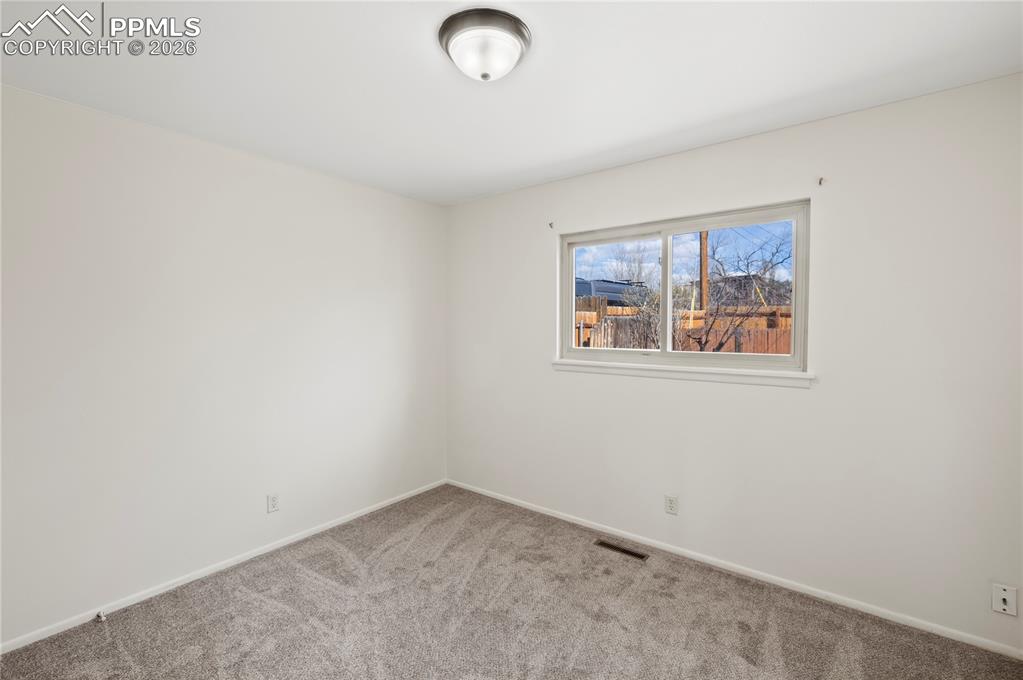 Image 13 of 50: Bedroom