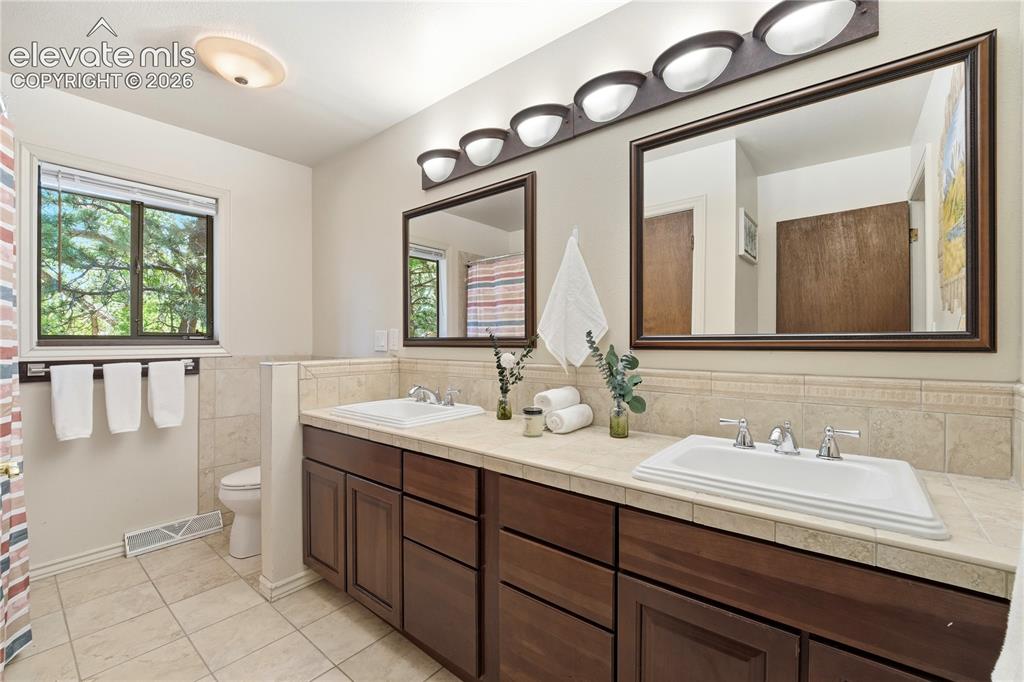 Image 19 of 50: Main Level Guest Bath