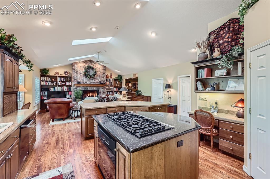 Image 23 of 49: Lovely flowing floor plan with family room off of the kitchen, mudroom and