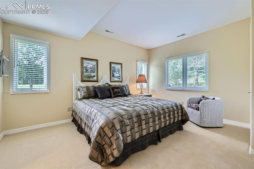 Image 37 of 49: basement bedroom suite with Cheyenne views