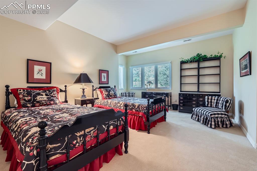 Image 39 of 49: Basement bedroom with Cheyenne views