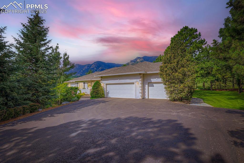 Image 44 of 49: Enjoy sunsets over Cheyenne Mountain