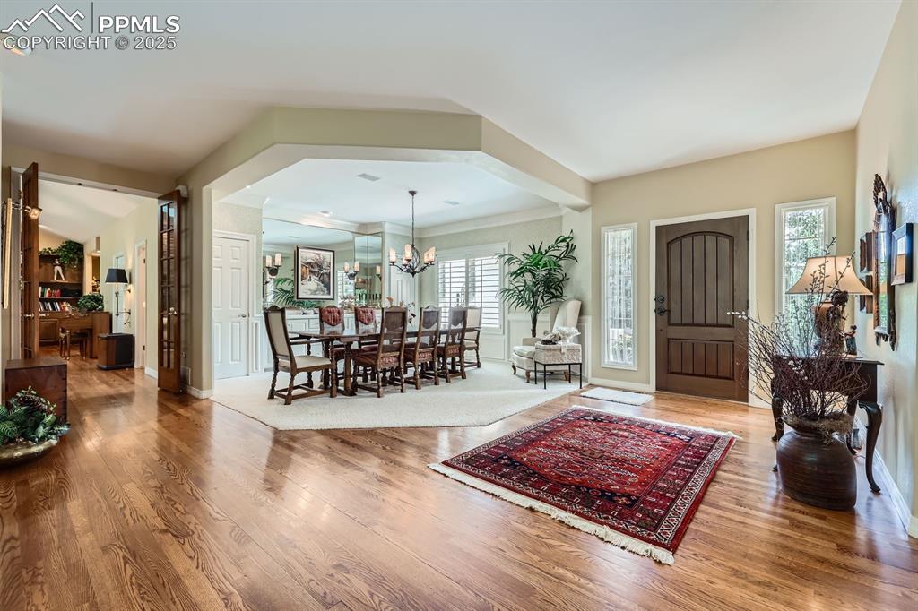 Image 7 of 49: wonderful dining room with trey ceiling and built in buffet and linen close
