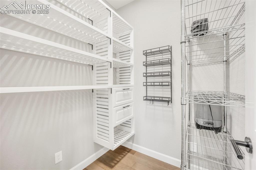 Image 12 of 37: custom shelving in pantry