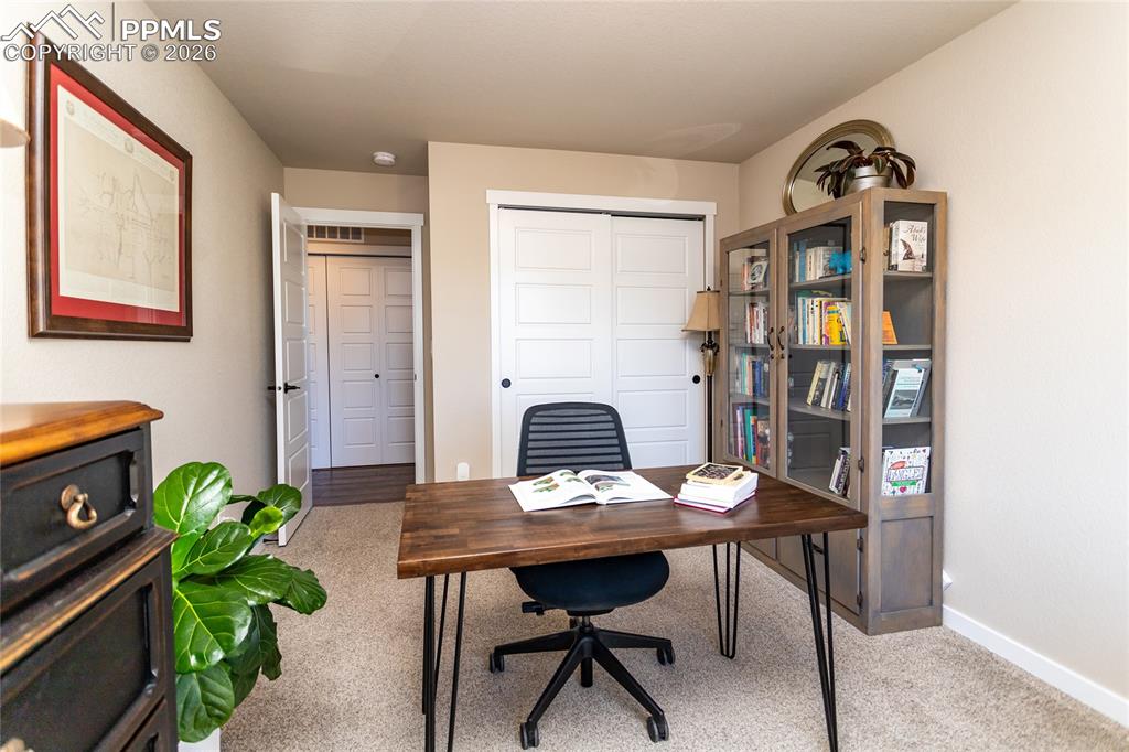 Image 24 of 36: BR 2 doubles as a home office! 